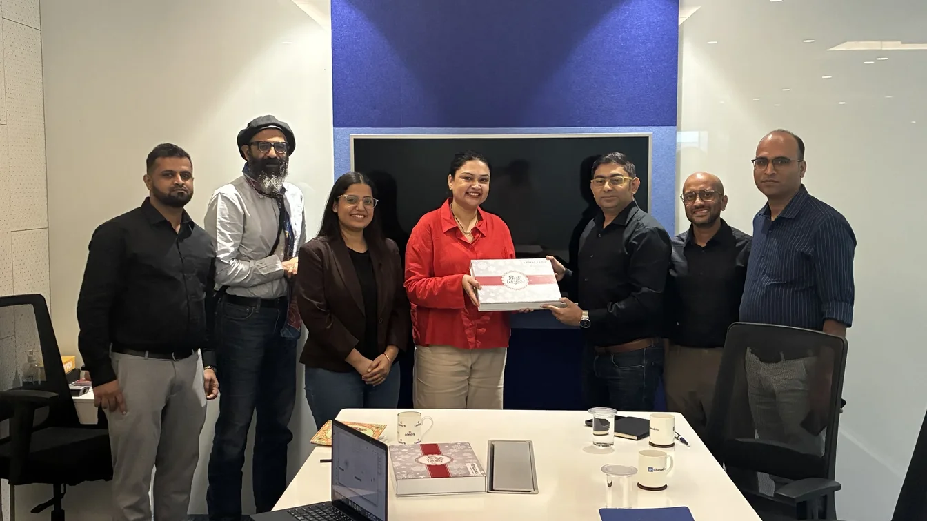 Royal Canin team presenting a recognition gift to the 1Channel team for the RCStart Loyalty App